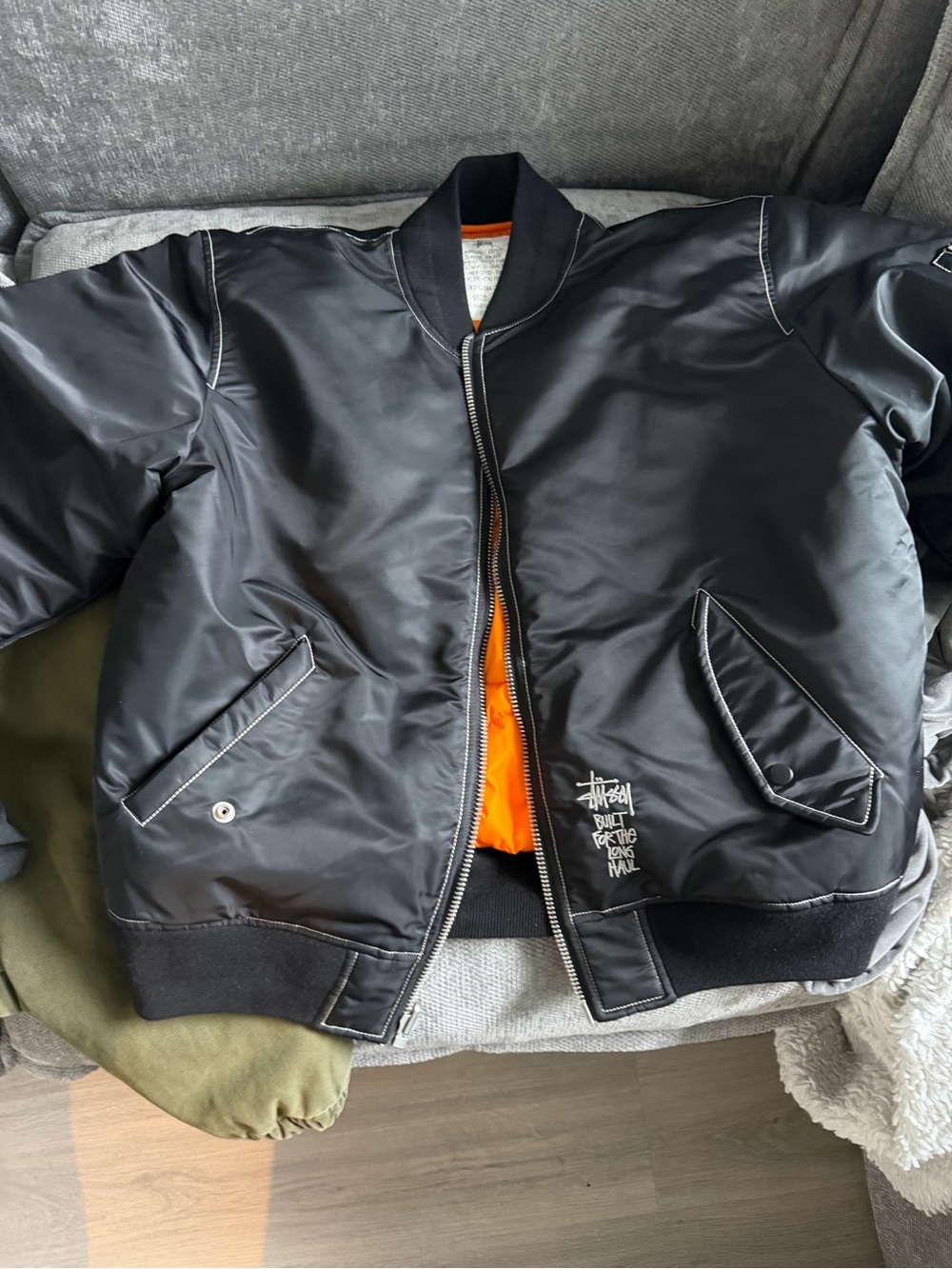 Stussy Black Bomber Jacket with Orange Lining